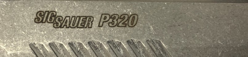 Engrave mark on a stainless steel receiver. 